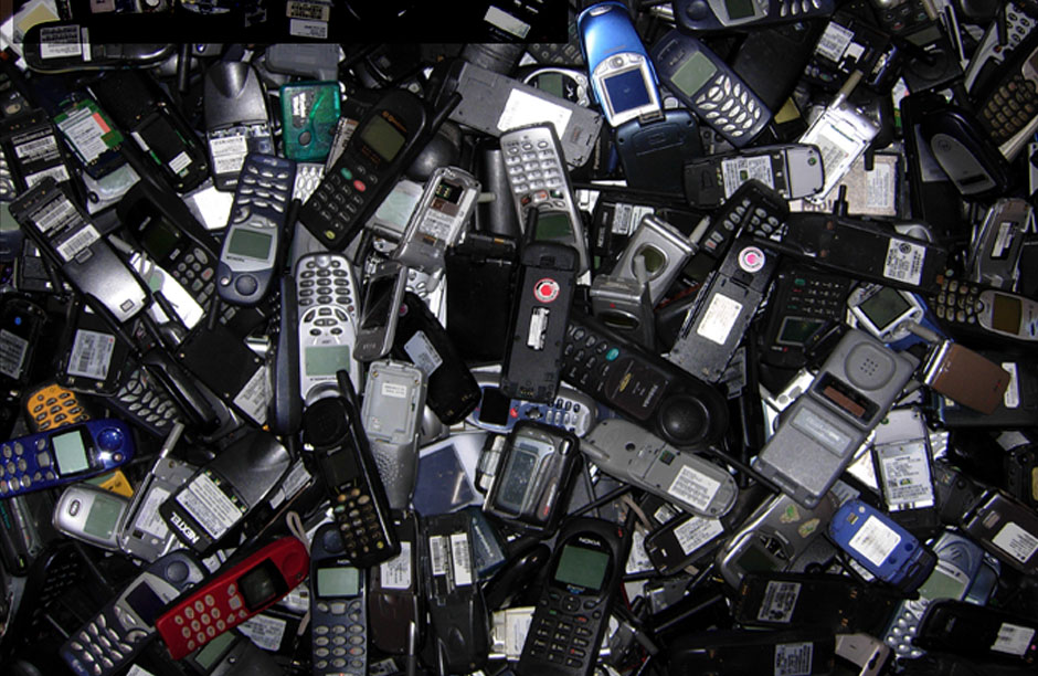 "When a cell phone rings the last thing you would think of is gorillas": Discarded cell phones pile up at the Eco-Cell office in Louisville, Kentucky.