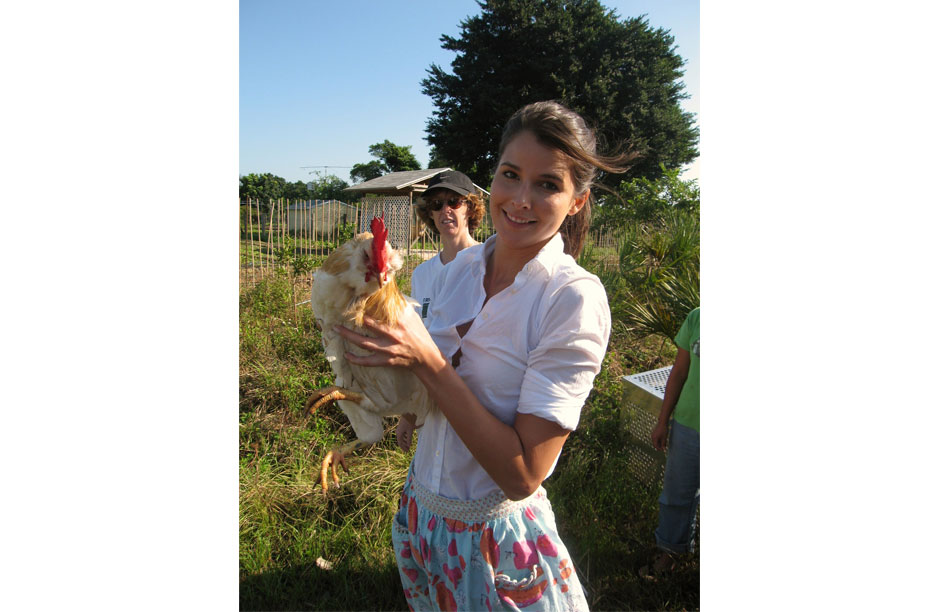 The author, Julie Hooper, with the chicken she is about to slaughter.