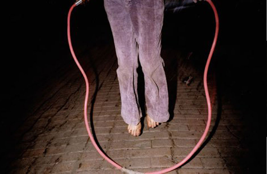 Mark Cohen, "Pink Jump Rope" (1975) from the series titled "Grim Street". Courtesy of the artist and Robert Klein Gallery.