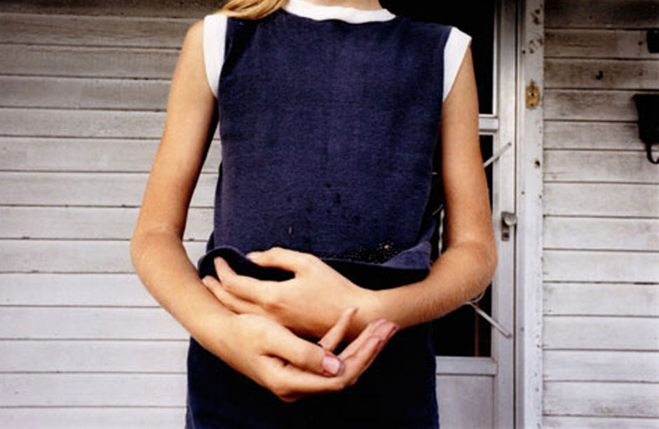 Mark Cohen, "Girl Holding Blackberries, Wilkes Barre, PA" (1975). Courtesy of the artist and Robert Klein Gallery.