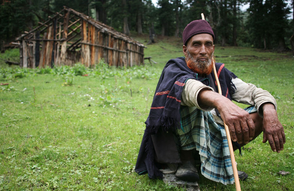 Ali Sen sits outside the shell of his previous dehra (home) in Govind Pashu Vihar Wildlife Sanctuary. photo by Ben Lenzner