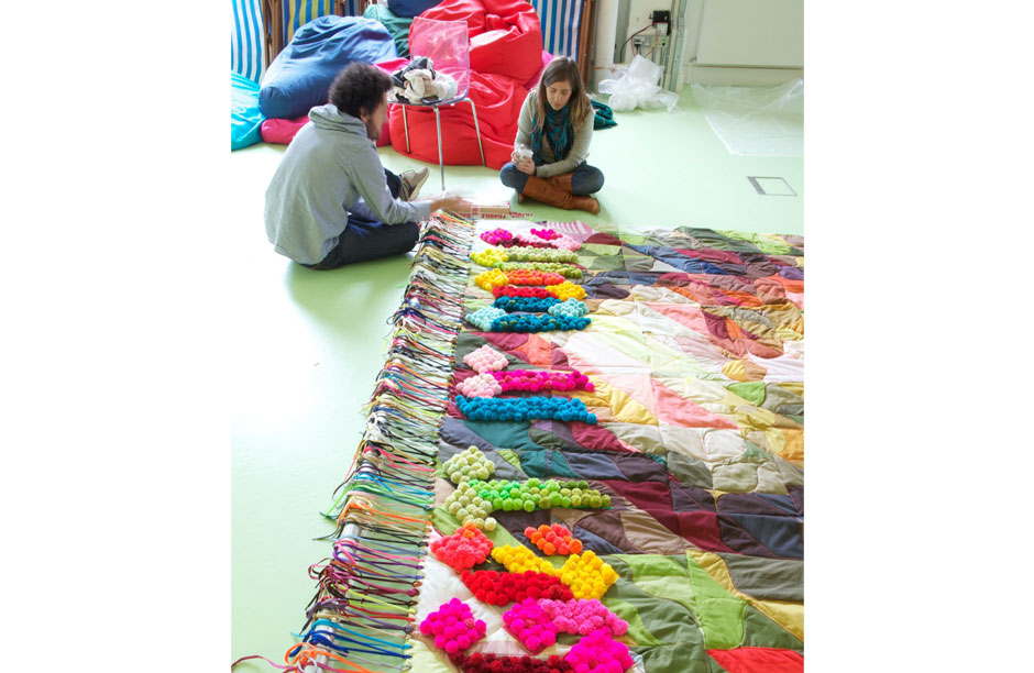 Dana and an assistant in London a few days before the unveiling of the quilt.