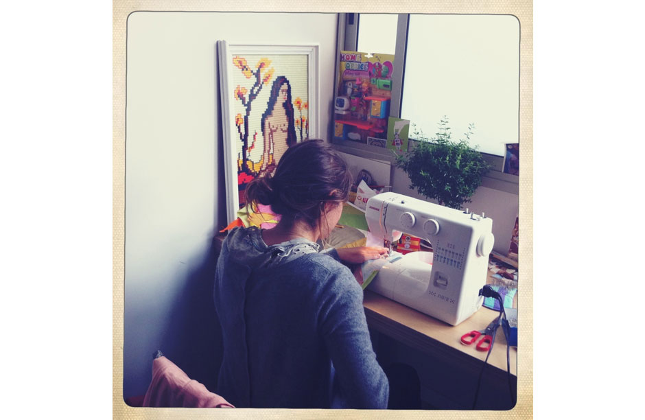 The author, textile designer Dana Haim, at work in her Tel Aviv apartment.