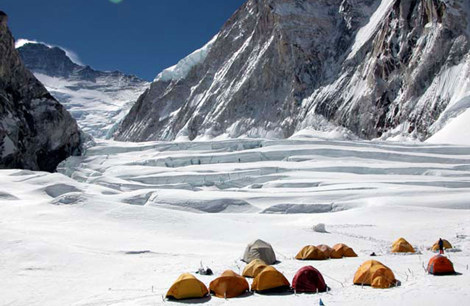 Waking up on top of the world - the tent village on Everest. Click the white arrow in the slideshow to view more photos from the expedition.