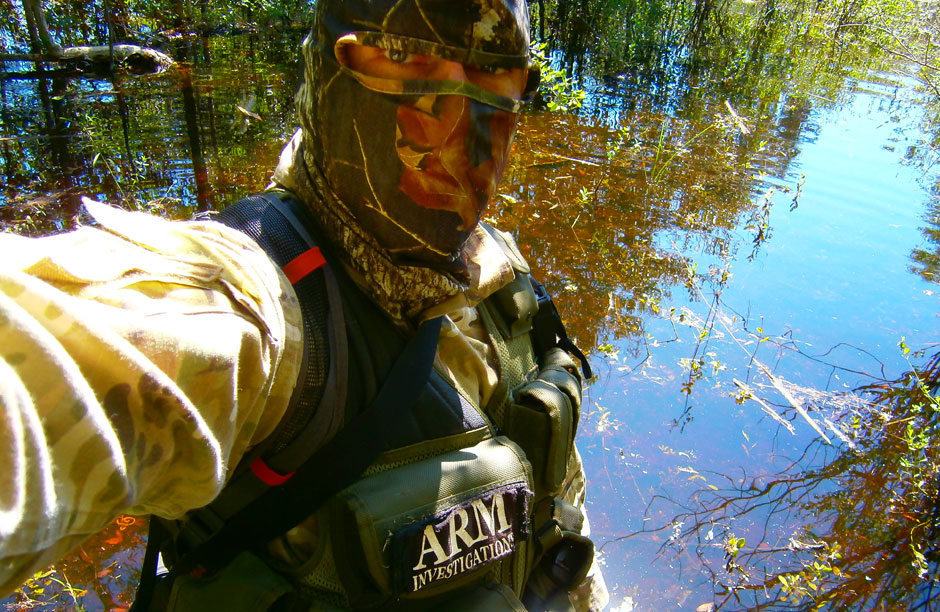 Richard "Kudo" Couto, the founder of ARM, in an Everglades swamp. Much of ARM's work entails going where others will not venture. This means dressing in camo and wading through alligator infested waters that are often filled with animal carcasses and illegally dumped waste.